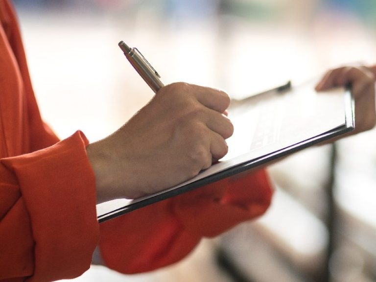 Clipboard image Person holding a clipboard